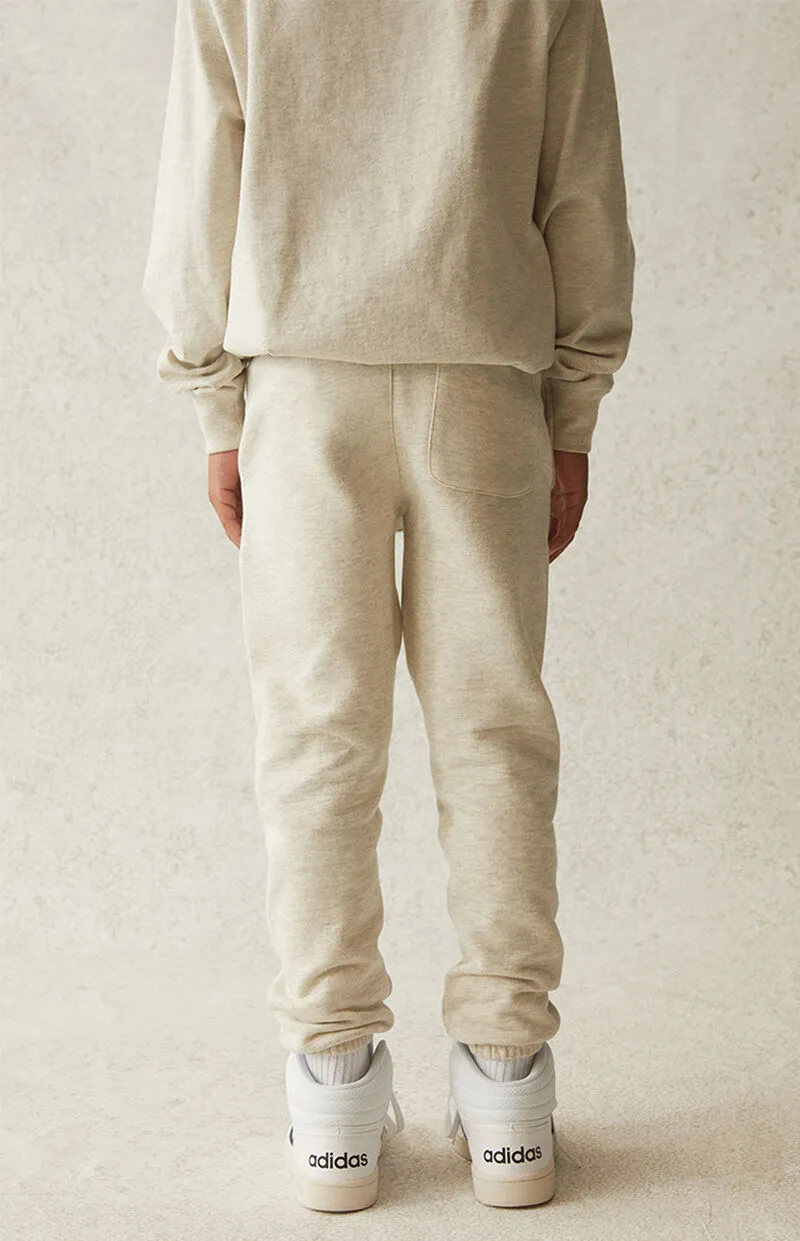 FEAR OF GOD ESSENTIALS SWEATPANTS SS21 LIGHT OATMEAL KIDS/JR